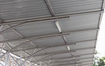 installing Sutton On The Forest metal roofing